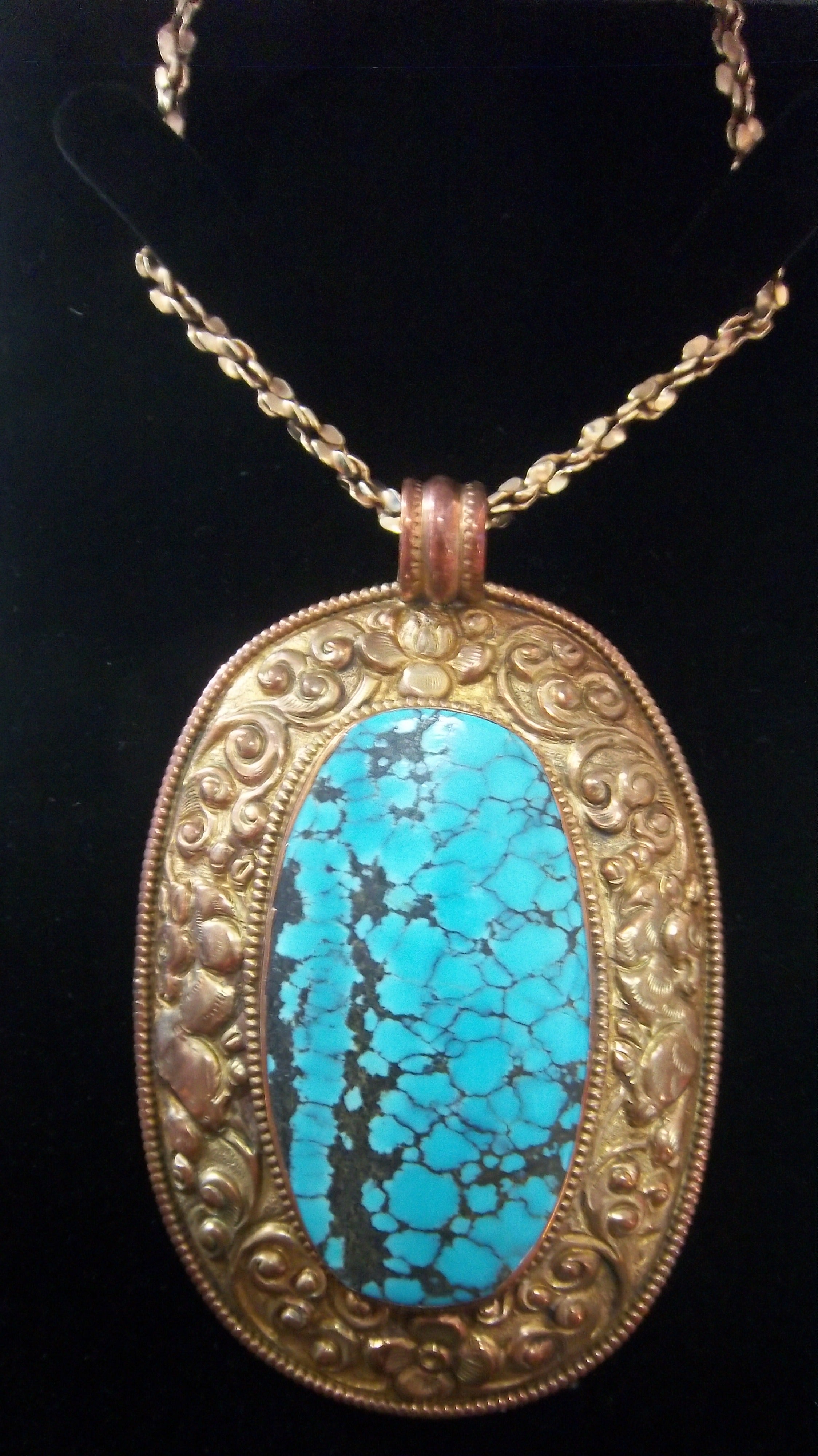 Long Gold, Brass, and Turquoise Necklace